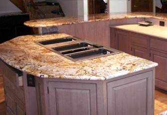 Qualey Granite designs and installs granite, quartz, marble and natural stone countertops, vanities, tub surrounds, hearths, walk ways and walls with one of the largest natural stone inventories Maine.
